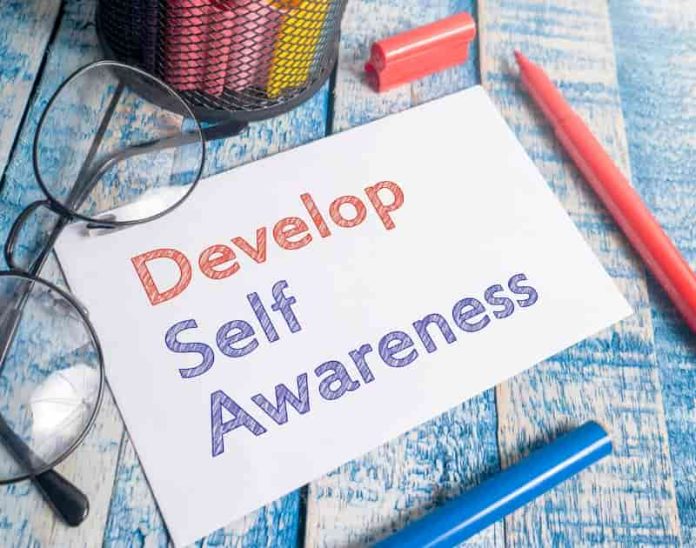 develop self awareness written on a piece of paper